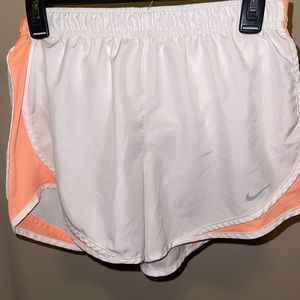 White and orange athletic shorts